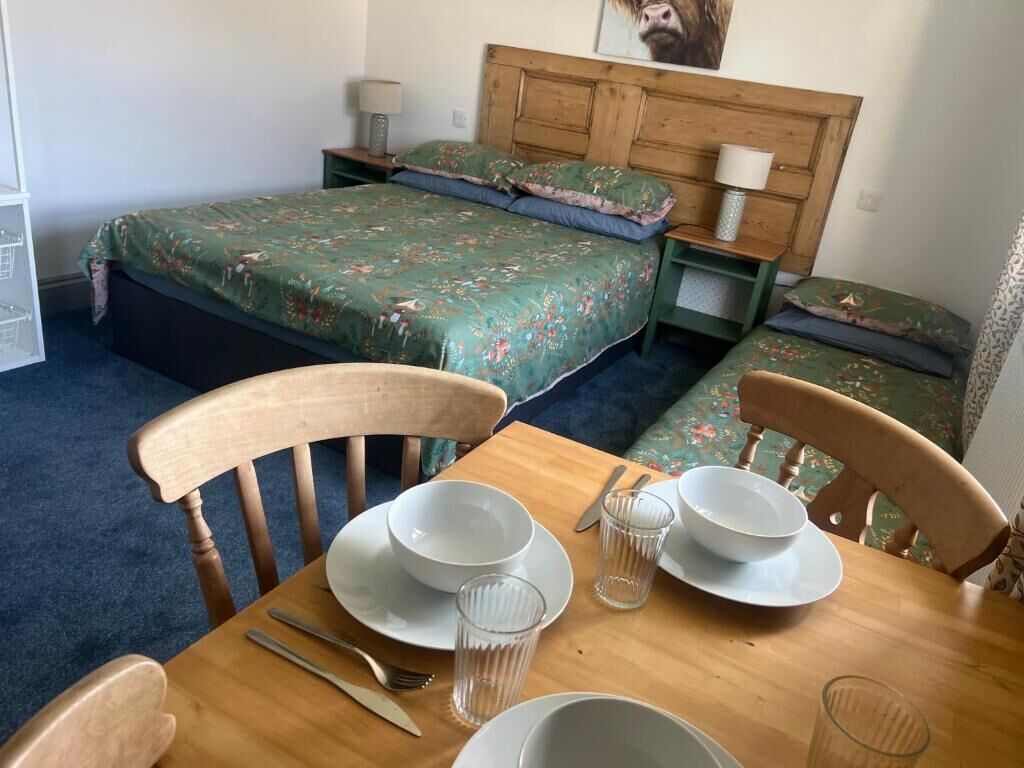 Habitación familiar, vista al jardín, planta baja