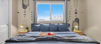 Cozy travel-themed retreat near Tamarack shops, dining, games & coffee bar.