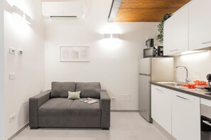 Deluxe Studio, Courtyard View | Living area - VOLTA COLLECTION BY HALLDIS (Como)