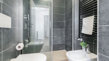 Deluxe Studio, City View | Bathroom | Shower, hair dryer, towels, soap