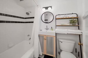 Shower, hair dryer, towels, soap - Stylish Condo by Convention Center, Dog-Friendly (Seattle)
