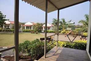 Deluxe Cottage, 1 Bedroom, Garden View | Garden view - Vanray Farm And Resort (Talala)