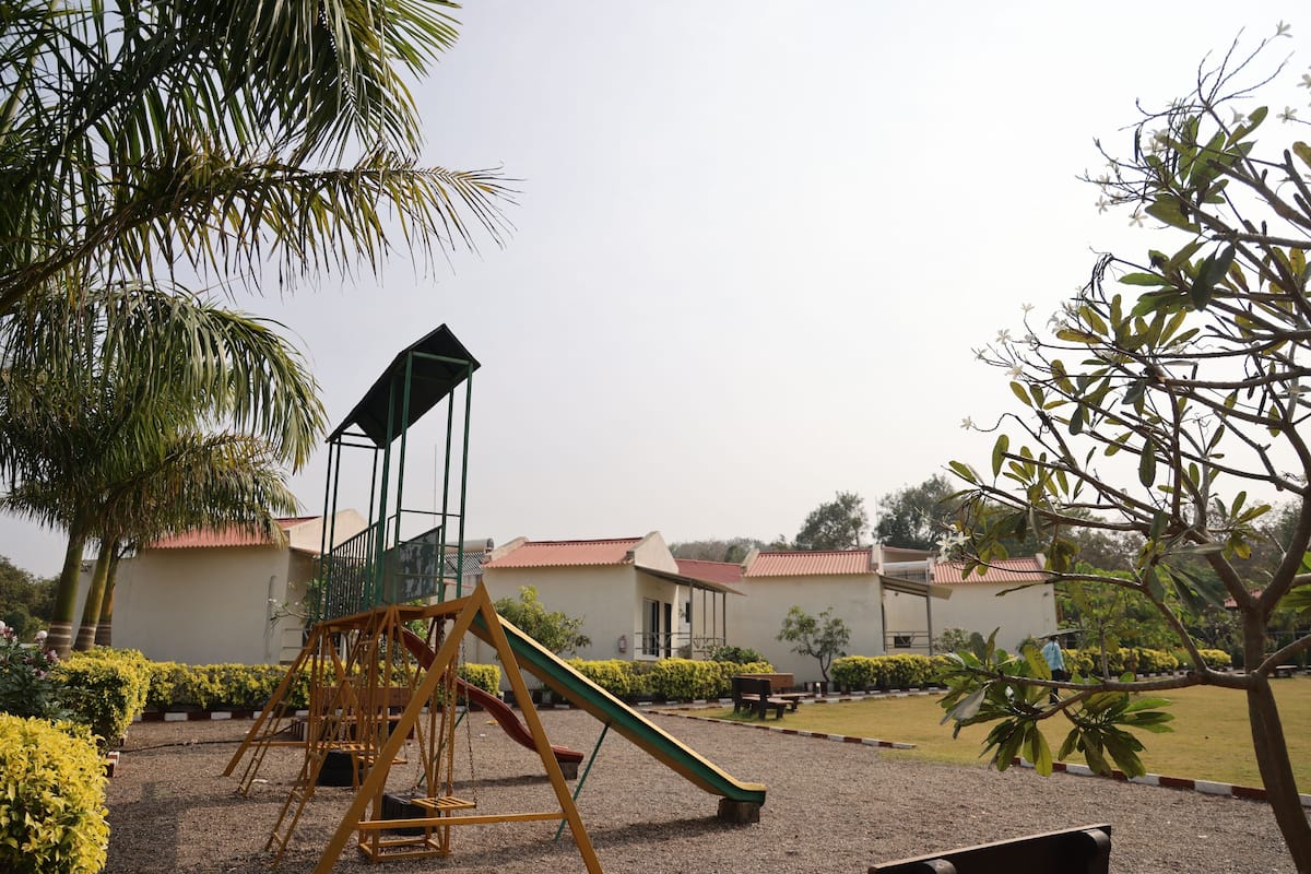 Casa de campo, vista para o jardim | Área infantil