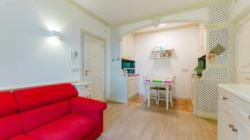 Appartement Deluxe, vue cour intérieure | Coin séjour