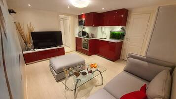 Apartment, 2 Bedrooms, Balcony, Garden View | Living room
