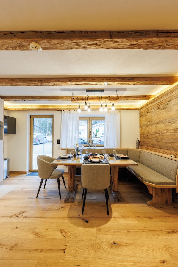 Apartment 1 - Gams | Living area | 50-inch flat-screen TV with satellite channels