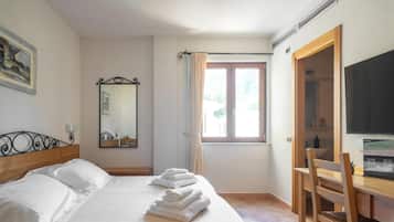 Camera Comfort con letto matrimoniale o 2 letti singoli | Una cassaforte in camera, Wi-Fi gratuito