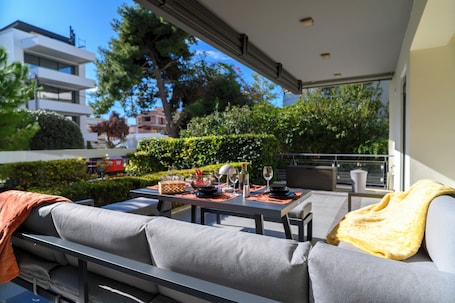 Outdoor dining. Athenian Riviera Prestige 2 bedroom