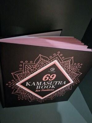 A book titled "69 Kamasutra Book: Sex Positions".