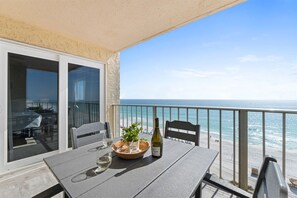 Outdoor dining - Gulffront Condo w/ Tiki Bar, Pools, & Sunsets (Panama City Beach)