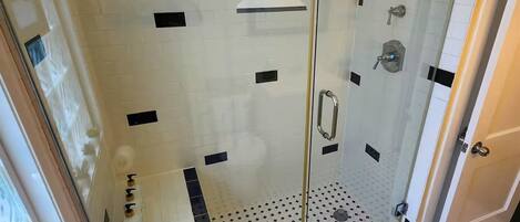 Shower, hair dryer, towels, soap