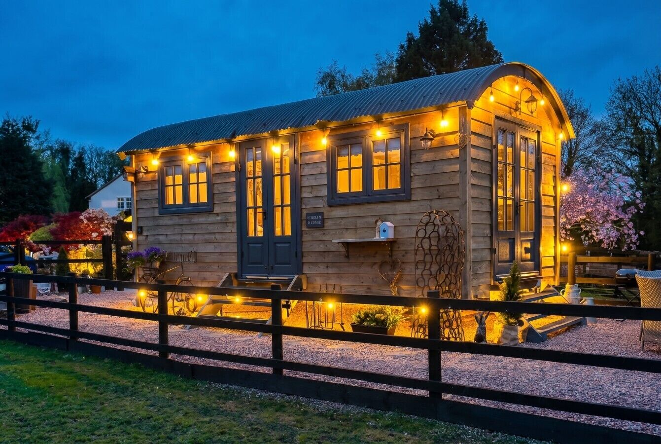 Wooley Warmer glows under fairy lights on a warm spring evening.