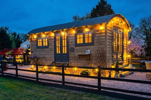 Wooley Warmer glows under fairy lights on a warm spring evening.