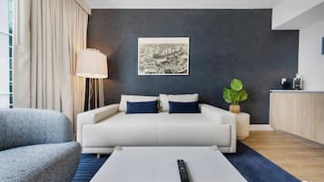 Apartamento, balcón, vistas a la ciudad | Zona de estar