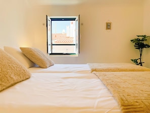 2 habitaciones, tabla de planchar con plancha, wifi y ropa de cama