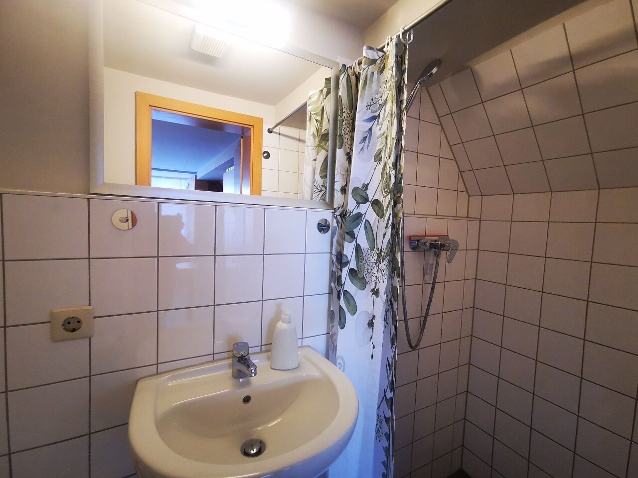 Shower, towels, toilet paper