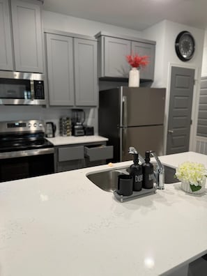 Fridge, microwave, coffee/tea maker, electric kettle