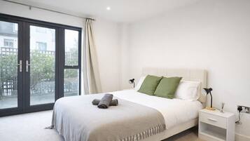 2 bedrooms, desk, iron/ironing board, travel cot