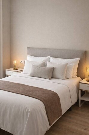 Escritorio, cuna de viaje, wifi y ropa de cama 