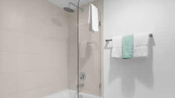 Shower, hair dryer, towels, shampoo
