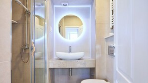 A bathroom with a glass-enclosed shower, a white sink, and a toilet. - Sophie 1 - Old Town Heritage Suite (Dubrovnik)