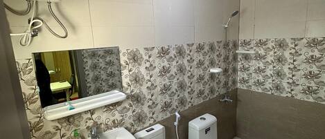 Shower, hair dryer, towels, soap