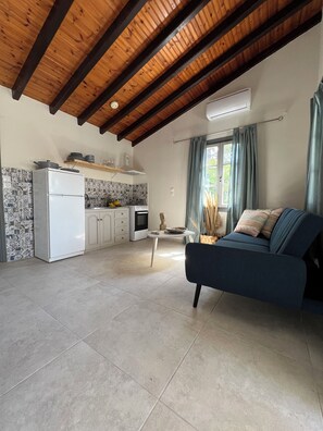 Family Apartment, Balcony, Garden View | Living area