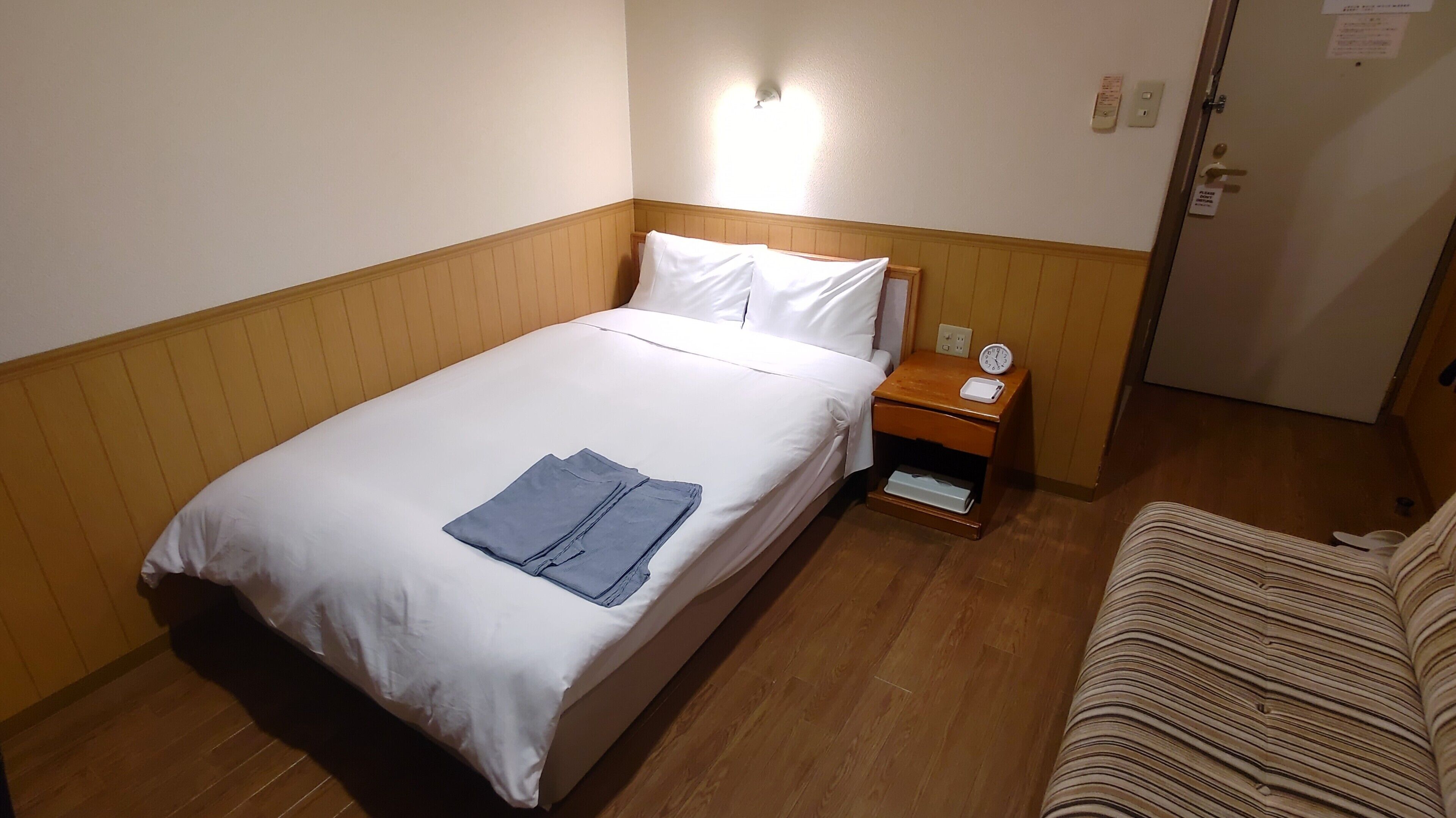 Down comforters, blackout drapes, WiFi (free), bed sheets
