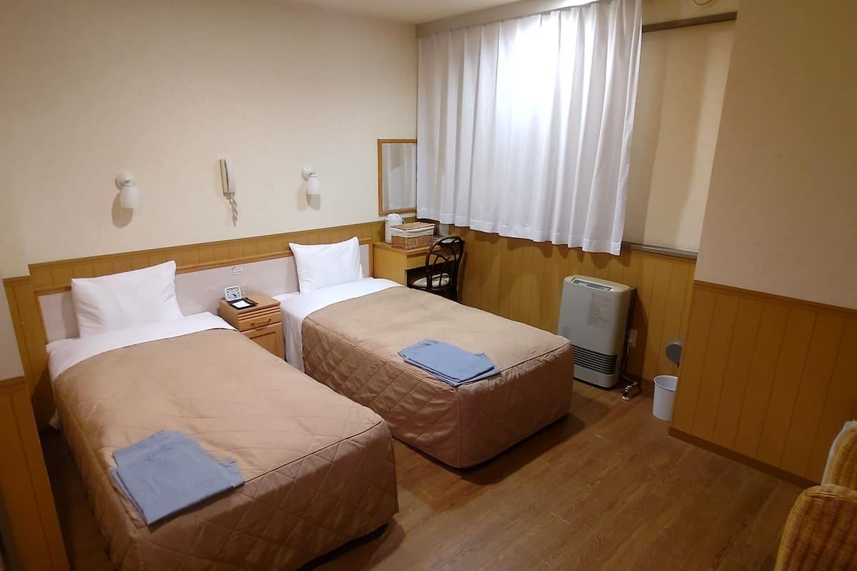 Down comforters, blackout drapes, WiFi (free), bed sheets