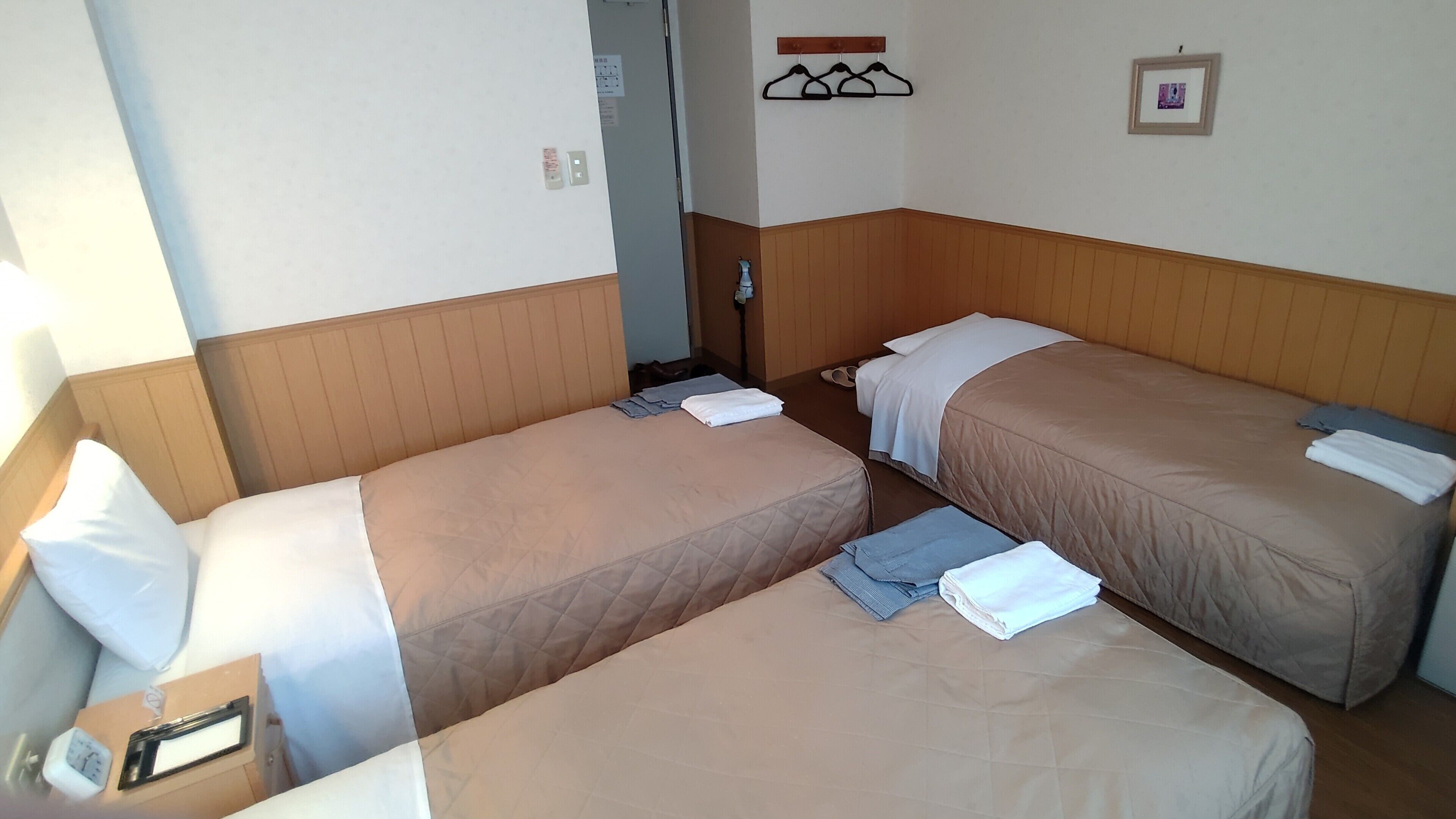 Down comforters, blackout drapes, WiFi (free), bed sheets
