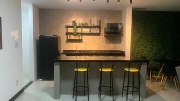 Apartamento, vista para a piscina | Cozinha privada