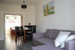 Comfort Apartment, Garden View | Living area