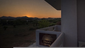 A view from a balcony with a sign reading 'Diana's casas.' - Diana s House 4 - Gytheio Sandy Beach Haven (East Mani)