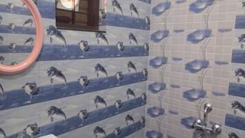 Shower, towels, soap, toilet paper
