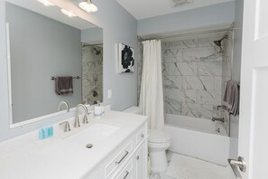 Hair dryer, towels, soap, shampoo