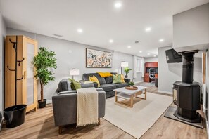 Living area - The Owl House • 2 Suites • Pet Friendly • Fenced Yard • Near UofC & Hospitals (Calgary)