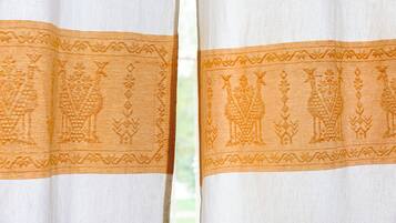 A curtain with a patterned design.