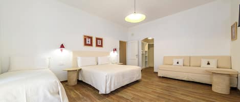 Quadruple Room, Balcony | In-room safe, desk, laptop workspace, blackout drapes