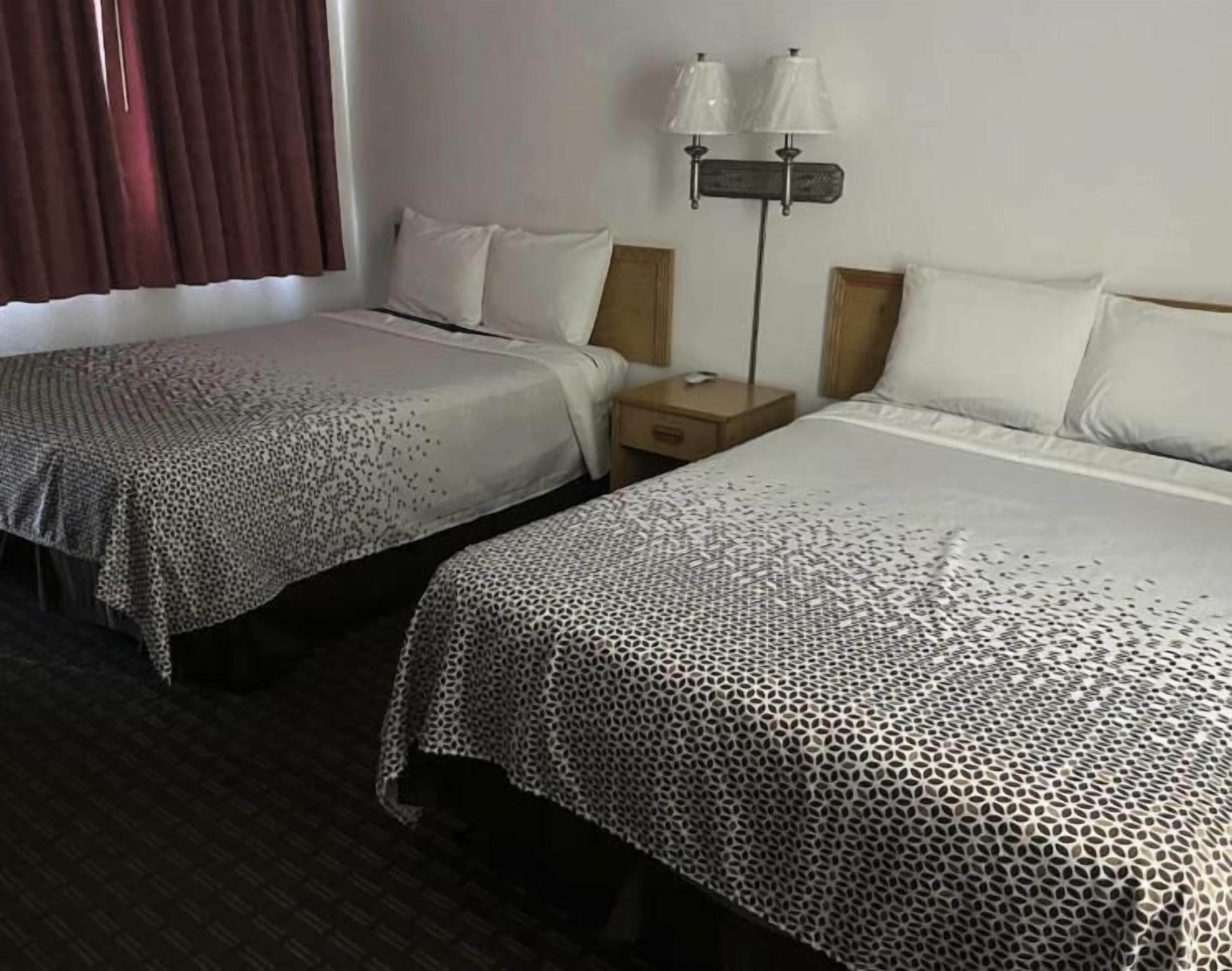 Signature eenpersoonskamer, 2 queensize bedden, niet-roken, kitchenette