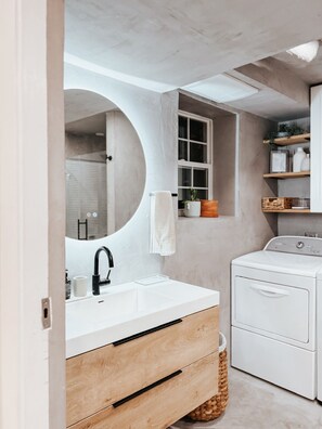 Bathroom - Modern farmhouse charm meets warm, elevated comfort. (Unknown)
