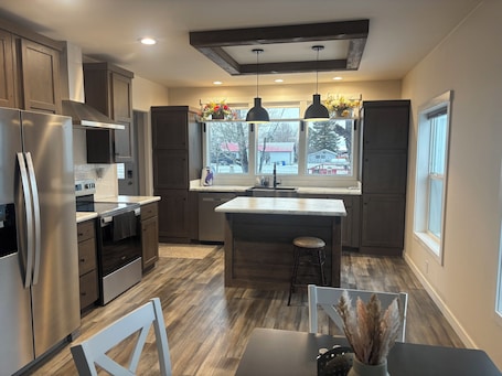 Private kitchen. New and comfortable home with open floor plan and electric fireplace.
