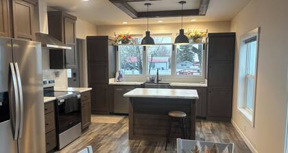 New and comfortable home with open floor plan and electric fireplace.