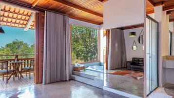 Quarto premium | Área de estar