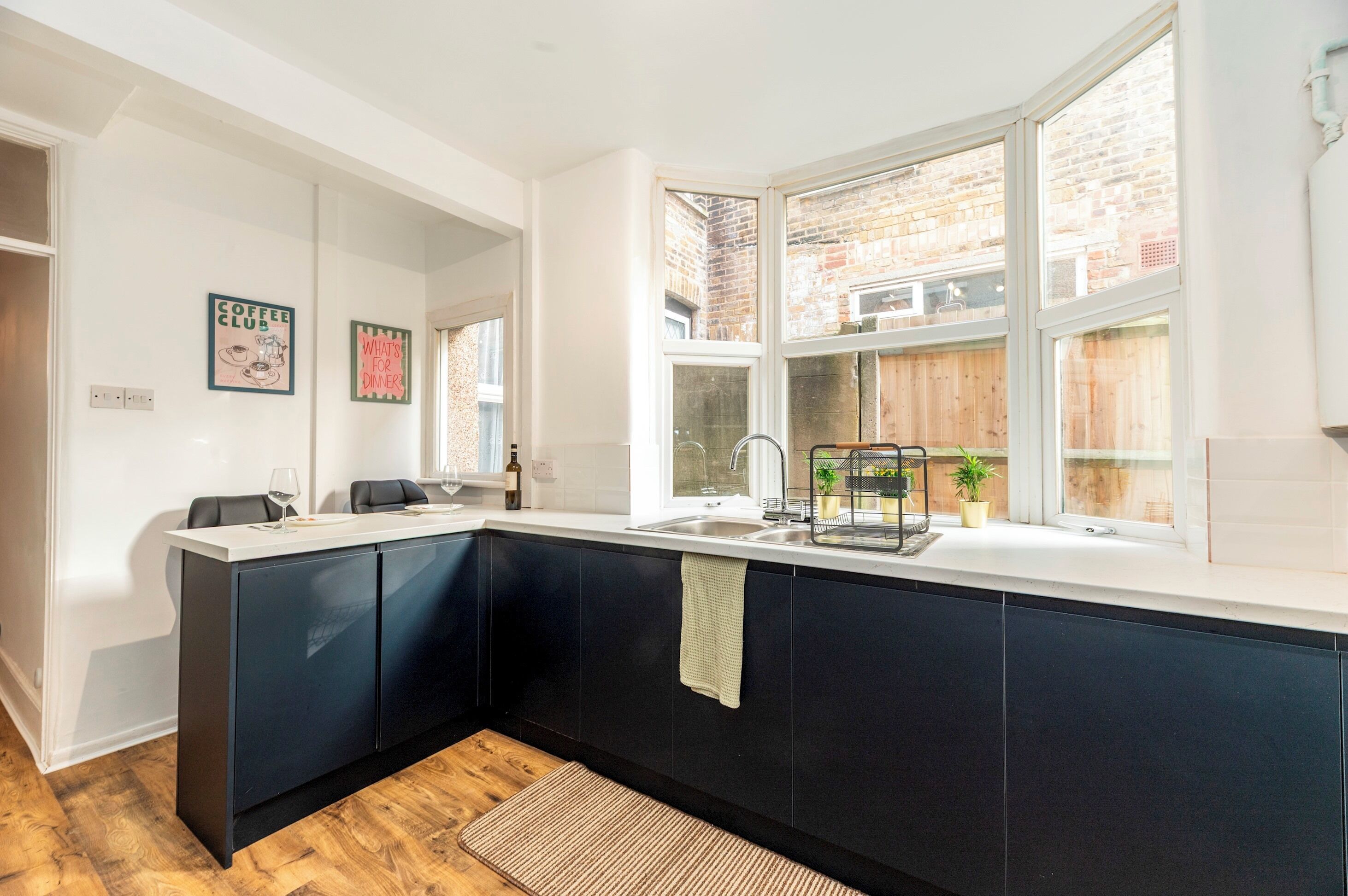 Fridge, microwave, toaster, dining tables