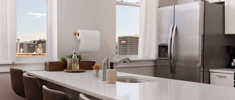 Coffee/tea maker, fridge, microwave, oven