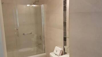 Shower, free toiletries, hair dryer, towels