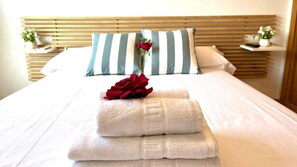 1 habitación, tabla de planchar con plancha, wifi y ropa de cama 
