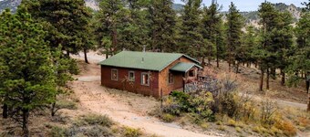 Nestled on the cusp of the majestic Machin's Cottage #2 RMNP Pet Friendy