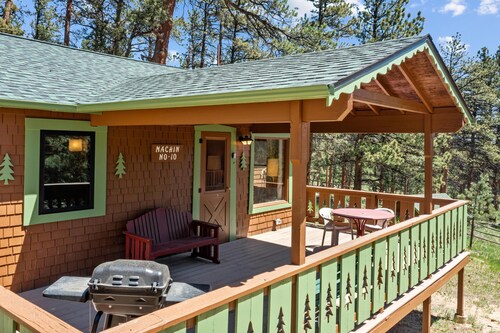 Get ready to embrace the rustic charm of Machin Cottage #10 Pet Friendly