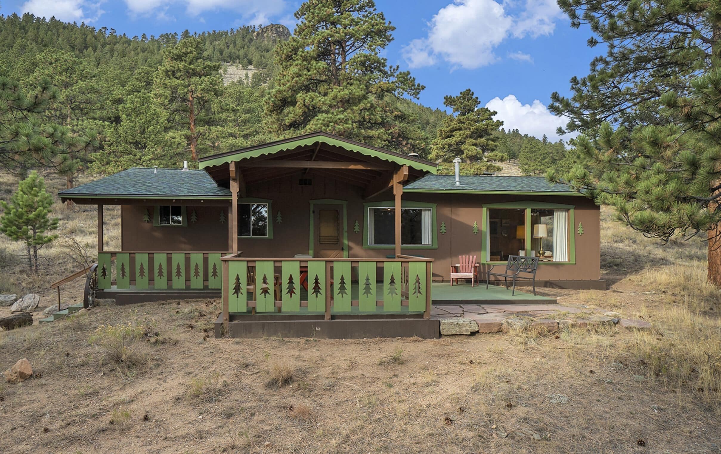 Cabin retreat with spacious porch and mountain views